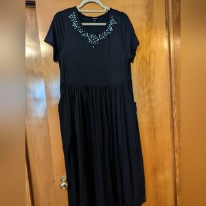 Elegant Black Dress with Embellished Neckline
